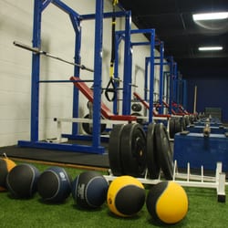 Advantage Strength and Conditioning - Racks, platforms, bumper plates