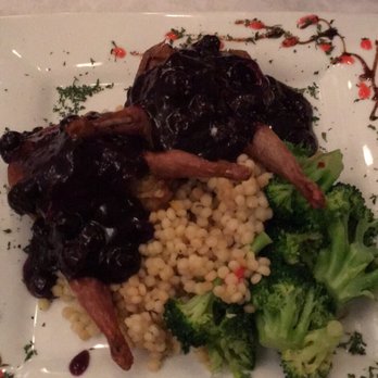 Serenity Bistro - Stuffed quail with blue berry reduction & couscous/ artichoke dip - New American Near Me - West Yellowstone, Montana Serenity Bistro - Stuffed quail with blue berry reduction & couscous/ artichoke dip - New American Near Me - West Yellowstone, Montana