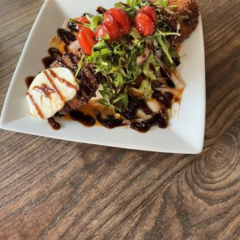 Cavo's Bar & Kitchen - Caprese with fried green tomatoes - Sports Bars Near Me - Orlando, Florida Cavo's Bar & Kitchen - Caprese with fried green tomatoes - Sports Bars Near Me - Orlando, Florida