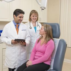 Dr. H. Ukani - Dr. H. Ukani with a patient