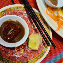 Pho Bobun - Oyster sauce and chili oil to dip the beef in. Also a diced red thai chili pepper. Not traditional Viet.