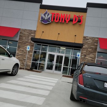 Tony D's - two cars parked in front of the store - Steakhouses Near Me - New Palestine, Indiana Tony D's - two cars parked in front of the store - Steakhouses Near Me - New Palestine, Indiana