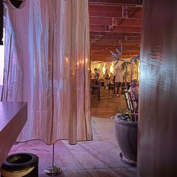 Holy Focaccia - The fabric curtain leading to the Slow Body section. - Farmers Market Near Me - Tucson, Arizona Holy Focaccia - The fabric curtain leading to the Slow Body section. - Farmers Market Near Me - Tucson, Arizona