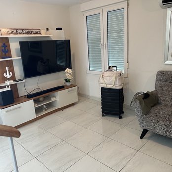 Villa Palmira - Other side of living room. Smart tv, surround system - Apartments Near Me - Punta Santiago, Puerto Rico
