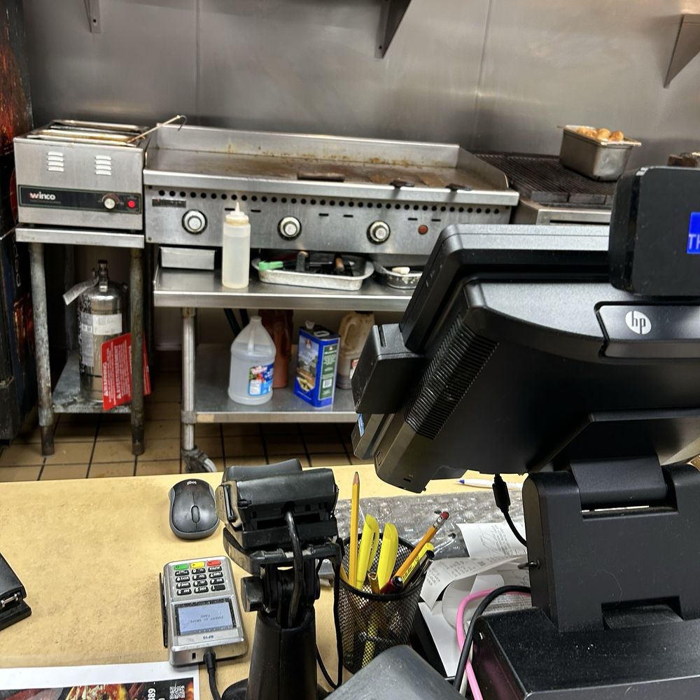 Wellesley North End Pizza - Grill gross cooking your food being delivered - Pizza Near Me - Wellesley, Massachusetts