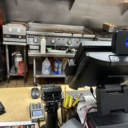 Wellesley North End Pizza - Grill gross cooking your food being delivered