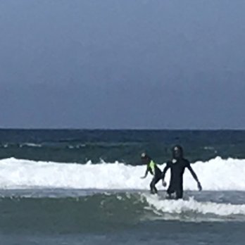 Learn To Surf - Nico up on a wave during his first lesson :) - Surf Schools Near Me - Santa Monica, California Learn To Surf - Nico up on a wave during his first lesson :) - Surf Schools Near Me - Santa Monica, California