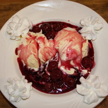 A Touch of Germany - Vanilla Ice Cream with hot cheeries (Sauerkirschen) - German Near Me - El Paso, Texas A Touch of Germany - Vanilla Ice Cream with hot cheeries (Sauerkirschen) - German Near Me - El Paso, Texas
