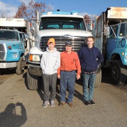 Infantino Disposal Services - Owner, Charlie with his grandsons, visiting him at the yard.