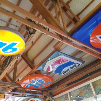 Nuttys junkyard Grill - Gas station signs throughout. - American Near Me - Arlington, Washington