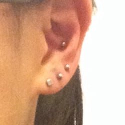 Platinum Ink Tattoo & Body Piercing - Second, third lobe and inner conch done!