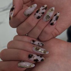 Painted Nail Lounge and Spa - Almond shaped nails with cheetah print, chrome 3d nail art