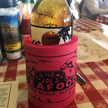 Conchy Joe's - Nice! Can koozie with your beer! - Seafood Near Me - Jensen Beach, Florida Conchy Joe's - Nice! Can koozie with your beer! - Seafood Near Me - Jensen Beach, Florida