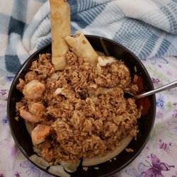 Asian Grille - Where's the special in this house special fried rice? Those 3 shrimp or 4 pieces of chicken? Pathetic. And 1 still had the poop trail!