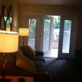 WorldMark Dolphin's Cove - Ground floor living room area leads to patio area. - Hotels Near Me - Anaheim, California