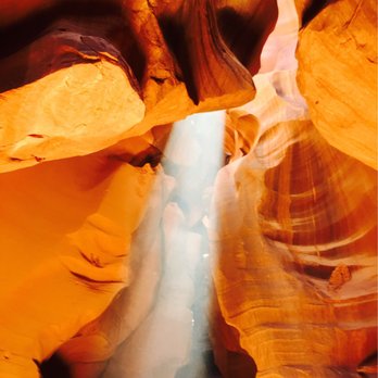 Upper Antelope Canyon - Upper Antelope Canyon - light beams are intensified when dust kicks up - Hiking Near Me - Page, Arizona Upper Antelope Canyon - Upper Antelope Canyon - light beams are intensified when dust kicks up - Hiking Near Me - Page, Arizona