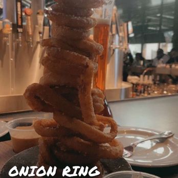 Yard House - Onion Ring Tower - New American Near Me - Atlanta, Georgia Yard House - Onion Ring Tower - New American Near Me - Atlanta, Georgia