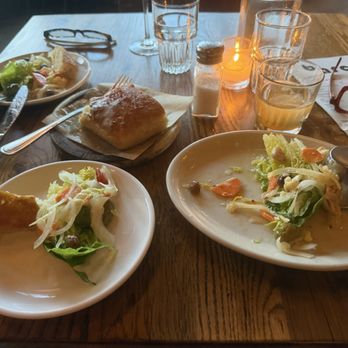 Barcelona Wine Bar - Ensalada Mixta shared at table - Wine Bars Near Me - Houston, Texas
