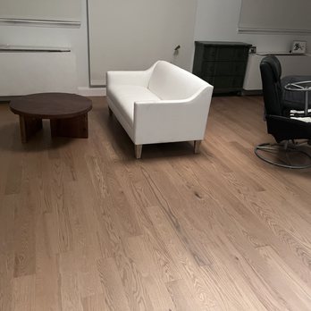 NYC Floor Pro - a living room with white furniture - Flooring Near Me - New York, New York