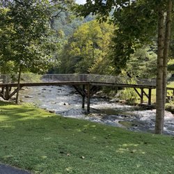 River Valley Campground - The breeze and sound of the stream is priceless . View as you pass the security gate