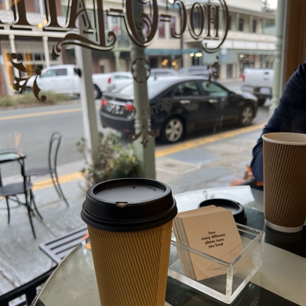 Table by the window with cute little table topic questions. We spent some time answering the questions while enjoying our coffee. Table by the window with cute little table topic questions. We spent some time answering the questions while enjoying our coffee.