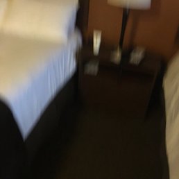 Personal items on bed stand Personal items on bed stand