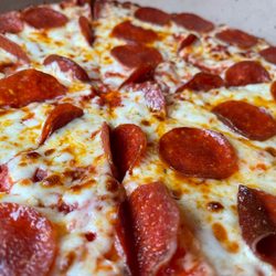 Fox's Pizza Den - Pepperoni pizza, medium, up close