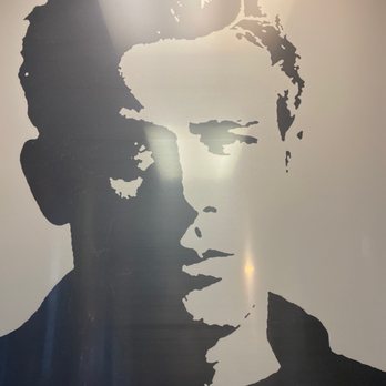 Frank's Color Cuts - Beautiful portrait on the wall of his salon. - Hair Salons Near Me - Guttenburg, New Jersey