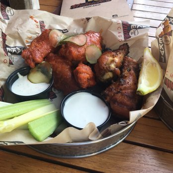 Jake Melnick's Corner Tap - Nashville Hot and Poncho's Garlic & Cayenne Grilled Wings - both were hits. Would make it hard to try another flavor by passing on these. - Sports Bars Near Me - Chicago, Illinois