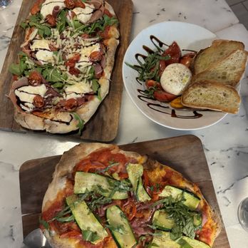Pinsa Rossa - Prosciutto & Stracciatella + Vegan Pinsa - Italian Near Me - San Francisco, California Pinsa Rossa - Prosciutto & Stracciatella + Vegan Pinsa - Italian Near Me - San Francisco, California