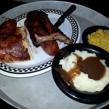 Hickory Park Restaurant Co. - BBQ sampler (baby back ribs, smoked link, quarter BBQ chicken) - American Near Me - Ames, Iowa