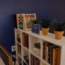 Lightning Repairs - Our little free library book shelf W/ games & puzzles