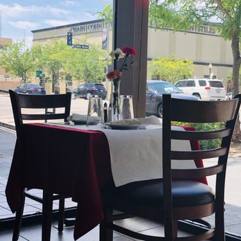 Mamma Mia - Cute table settings with fresh flowers on each one - Italian Near Me - Bakersfield, California