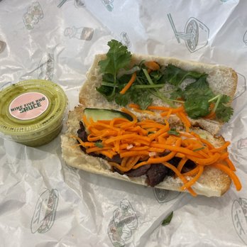 Nine Five Pho - Bahn Mi (with Grilled pork, cucumbers, pickled carrots and daikon, cilantro, watermelon radish and Nine Five Pho Sauce) - Vietnamese Near Me - Pembroke Pines, Florida