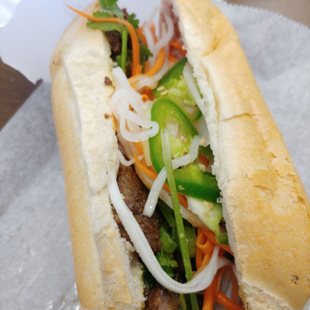 Bánh Mì Lê - Grilled beef Bahn Mi ($4.50 as of 1/2018). This one is a winner! - Vietnamese Near Me - Quincy, Massachusetts Bánh Mì Lê - Grilled beef Bahn Mi ($4.50 as of 1/2018). This one is a winner! - Vietnamese Near Me - Quincy, Massachusetts