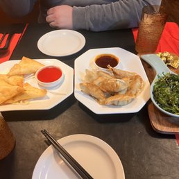 Cream cheese wontons, gyoza, wakame salad Cream cheese wontons, gyoza, wakame salad