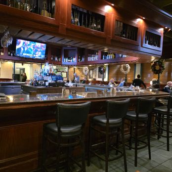Charleston's - Inside at the bar.  Tons of booths surround the bar. - American Near Me - Indianapolis, Indiana