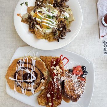 Broken Yolk Cafe - Chilaquiles in Green Sauce with Carne Asada & Trio Plate. - Breakfast & Brunch Near Me - Del Mar, California Broken Yolk Cafe - Chilaquiles in Green Sauce with Carne Asada & Trio Plate. - Breakfast & Brunch Near Me - Del Mar, California