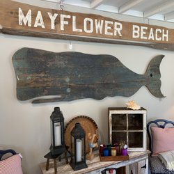 Gatherings at Home - Custom beach signs and whale made out of an antique door.
