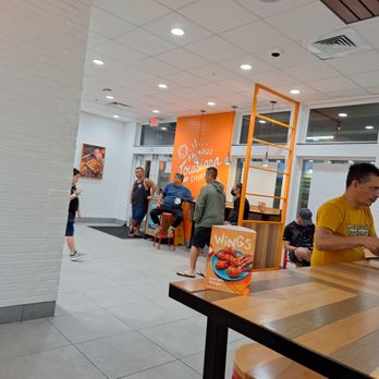 Popeyes Louisiana Kitchen - a group of people eating - Chicken Wings Near Me - Pahoa, Hawaii Popeyes Louisiana Kitchen - a group of people eating - Chicken Wings Near Me - Pahoa, Hawaii