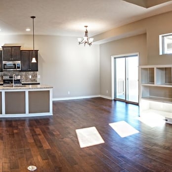 Timberland Hardwood Floors - a kitchen and living room - Flooring Near Me - Omaha, Nebraska Timberland Hardwood Floors - a kitchen and living room - Flooring Near Me - Omaha, Nebraska