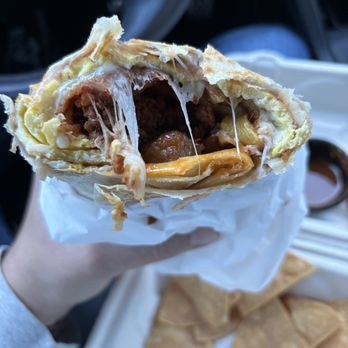 The Taco Shop Mexican Kitchen - TTS Breakfast Burrito with cheese and hot salsa. - Tacos Near Me - Ventura, California The Taco Shop Mexican Kitchen - TTS Breakfast Burrito with cheese and hot salsa. - Tacos Near Me - Ventura, California