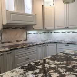 G & K Construction - Detailed tile install in kitchen