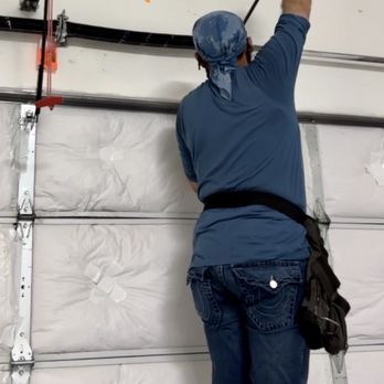 Garage Door King Services - Dialing in the new springs. - Garage Door Services Near Me Garage Door King Services - Dialing in the new springs. - Garage Door Services Near Me