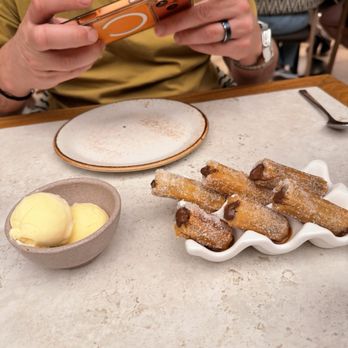 Telefèric Barcelona - Churro with chocolate - Spanish Near Me - Scottsdale, Arizona Telefèric Barcelona - Churro with chocolate - Spanish Near Me - Scottsdale, Arizona
