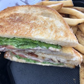 Tilted Kilt Pub & Eatery - Club sandwich and fries - Pubs Near Me - Lexington, Kentucky Tilted Kilt Pub & Eatery - Club sandwich and fries - Pubs Near Me - Lexington, Kentucky