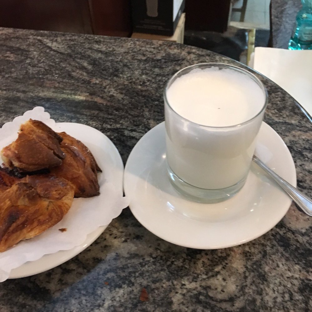 Bar Faggiani - Latte (just steamed milk) and fruit filled cornetto (Italian croissant). Both were great! - Desserts Near Me - Rome, RM Bar Faggiani - Latte (just steamed milk) and fruit filled cornetto (Italian croissant). Both were great! - Desserts Near Me - Rome, RM