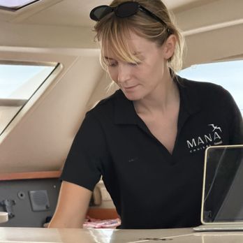 MANA Cruises & Charters - First Mate Taylor prepping - Boat Tours Near Me - Kapolei, Hawaii MANA Cruises & Charters - First Mate Taylor prepping - Boat Tours Near Me - Kapolei, Hawaii
