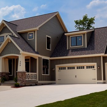 Overhead Door - Thermacore Collection Model 199 with Stockton II 8-Lite Windows and Almond Finish - Garage Door Services Near Me - Memphis, Tennessee Overhead Door - Thermacore Collection Model 199 with Stockton II 8-Lite Windows and Almond Finish - Garage Door Services Near Me - Memphis, Tennessee