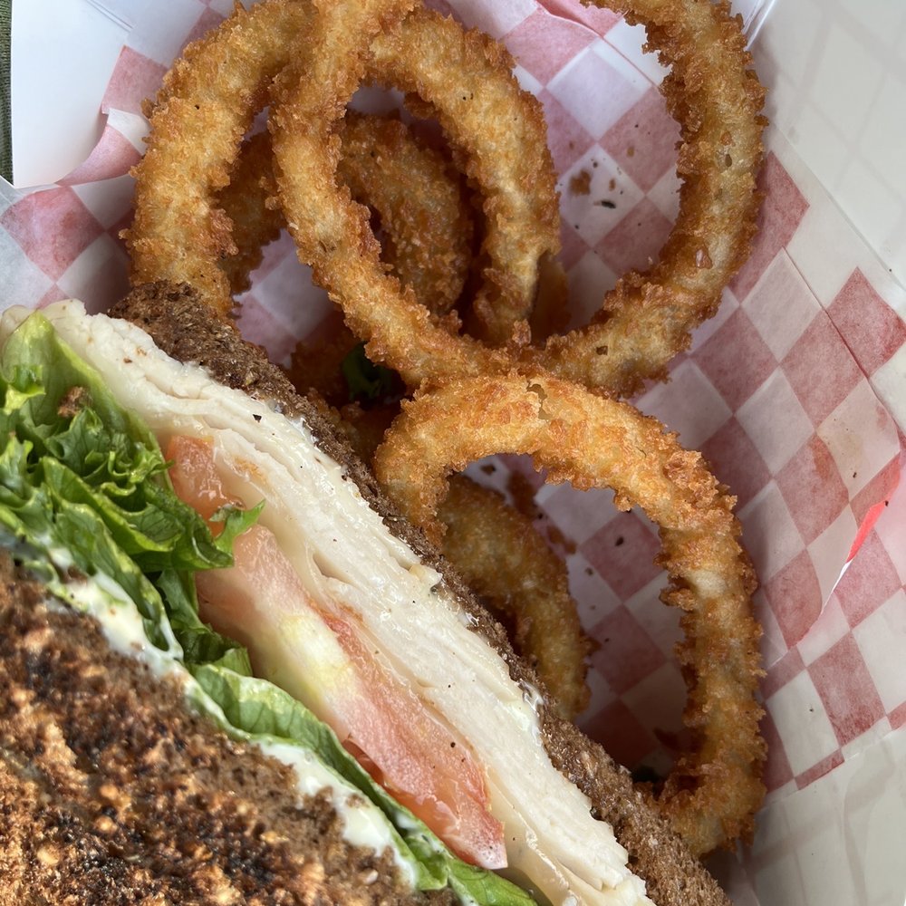 Warm Turkey sandwich with onion rings